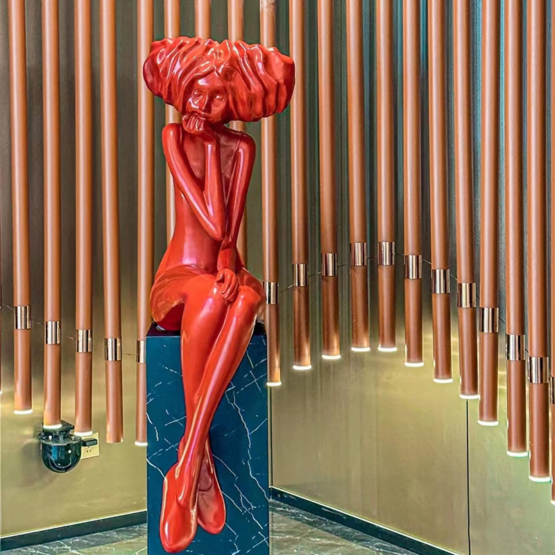Red Fiberglass Human Sculpture